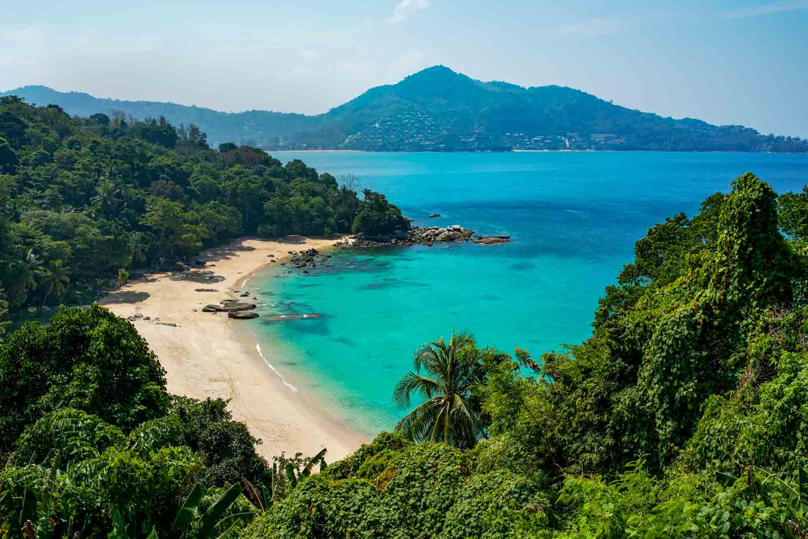 empty beach with turquoise water in sunny day in Thailand